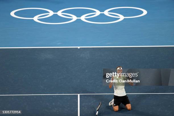 Alexander Zverev of Team Germany celebrates victory after his Men's Singles Gold Medal match against Karen Khachanov of Team ROC on day nine of the...