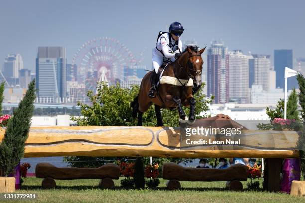 Laura Collett of Team Great Britain riding London 52 clears a jump during the Eventing Cross Country Team and Individual on day nine of the Tokyo...