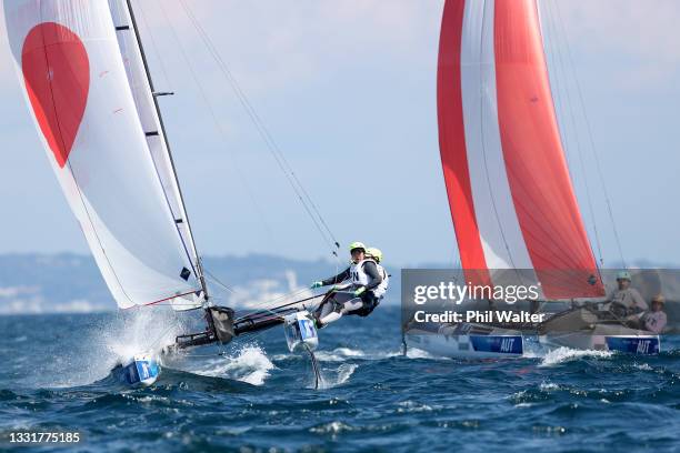 Shibuki Iitsuka and Eri Hatayama of Team Japan compete in the Nacra 17 Foiling class on day nine of the Tokyo 2020 Olympic Games at Enoshima Yacht...