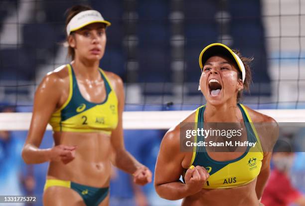 Mariafe Artacho del Solar and Taliqua Clancy of Team Australia react as they compete against Team China during the Women's Round of 16 beach...