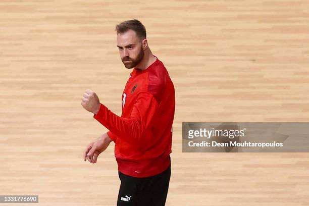 Andreas Wolff of Team Germany celebrates during the Men's Preliminary Round Group A handball match between Germany and Brazil on day nine of the...