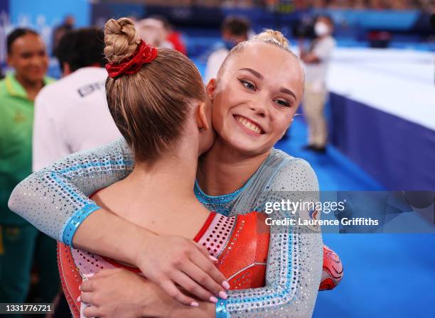 Liliia Akhaimova of Team ROC celebrates with teammate Anastasiia Iliankova in the Women's Vault Final on day nine of the Tokyo 2020 Olympic Games at...