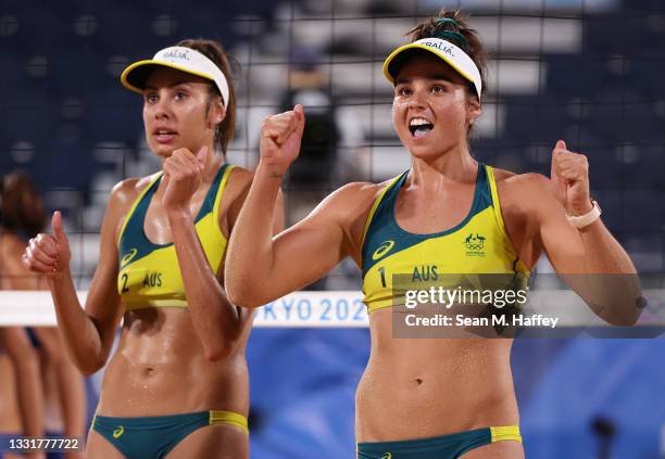 Mariafe Artacho del Solar and Taliqua Clancy of Team Australia react after they defeated Team China during the Women's Round of 16 beach volleyball...