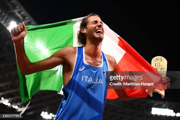 Gianmarco Tamberi of Team Italy reacts after winning the gold medal in the men's High Jump on day nine of the Tokyo 2020 Olympic Games at Olympic...