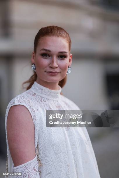 Jana Heinisch wearing a white lace dress on July 29, 2021 in Berlin, Germany.