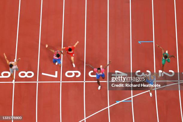 Lamont Marcell Jacobs of Team Italy wins the Men's 100m Final ahead of Fred Kerley of Team United States and Andre De Grasse of Team Canada on day...