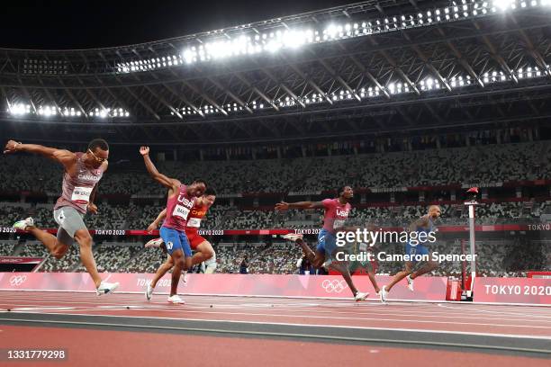 Lamont Marcell Jacobs of Team Italy wins the Men's 100m Final ahead of Fred Kerley of Team United States and Andre De Grasse of Team Canada on day...