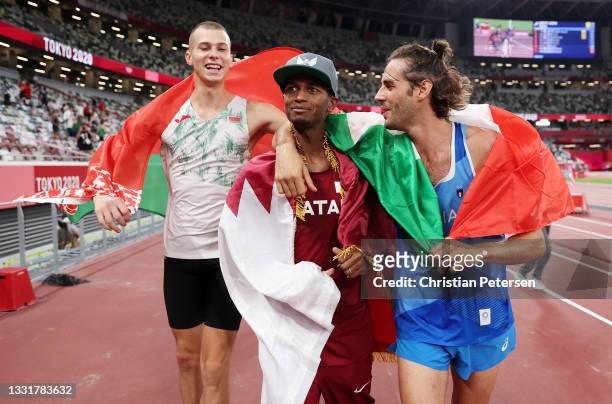 Bronze medalist Maksim Nedasekau of Team Belarus, Gold medalist Mutaz Essa Barshim of Team Qatar and silver medalist Gianmarco Tamberi of Team Italy...