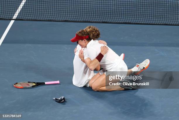 Anastasia Pavlyuchenkova of Team ROC and Andrey Rublev of Team ROC celebrate victory after their Mixed Doubles Gold Medal match against Elena Vesnina...