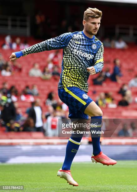 Timo Werner of Chelsea warms up prior to the Pre-Season Friendly match between Arsenal and Chelsea at Emirates Stadium on August 01, 2021 in London,...
