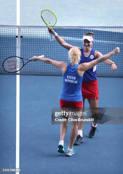 Barbora Krejcikova of Team Czech Republic and Katerina Siniakova of Team Czech Republic celebrate victory after their Women's Doubles Gold Medal...