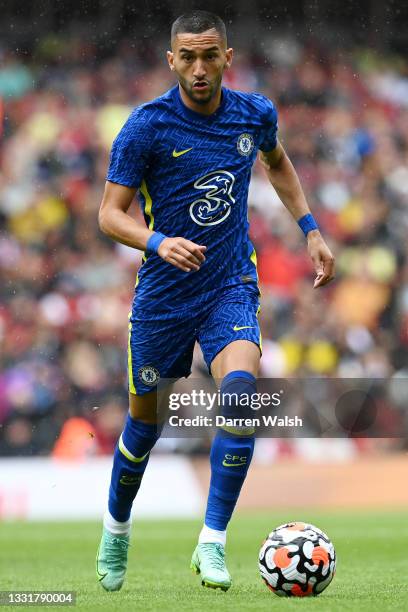 Hakim Ziyech of Chelsea runs with the ball during the Pre-Season Friendly match between Arsenal and Chelsea at Emirates Stadium on August 01, 2021 in...