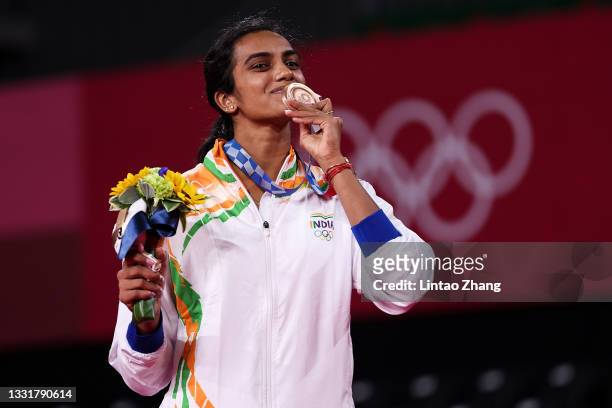 Bronze medalist Pusarla V. Sindhu of Team India poses on the podium during the medal ceremony for the Women’s Singles badminton event on day nine of...