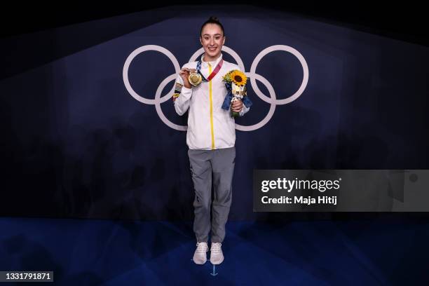 Nina Derwael of Team Belgium poses with the gold medal for the Women's Uneven Bars Final on day nine of the Tokyo 2020 Olympic Games at Ariake...