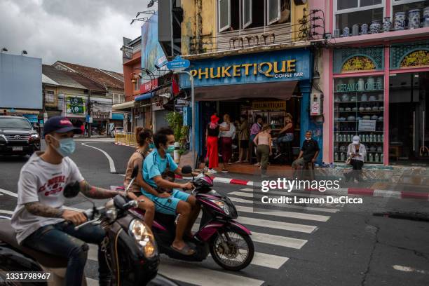 Sandbox travelers visit a popular coffee shop in Phuket Old Town on August 01, 2021 in Phuket, Thailand. Phuket Town remains a cultural center of...