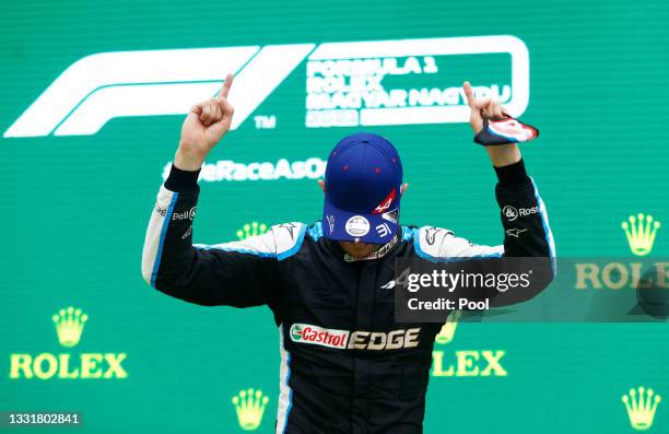 Race winner Esteban Ocon of France and Alpine F1 Team celebrates on the podium during the F1 Grand Prix of Hungary at Hungaroring on August 01, 2021...