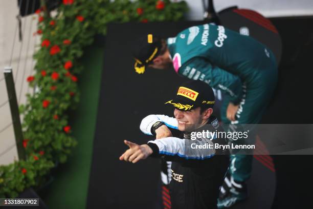 Race winner Esteban Ocon of France and Alpine F1 Team celebrates on the podium during the F1 Grand Prix of Hungary at Hungaroring on August 01, 2021...