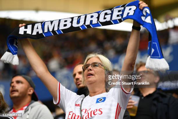 Fan of Hamburg watch during the Second Bundesliga match between Hamburger SV and SG Dynamo Dresden at Volksparkstadion on August 01, 2021 in Hamburg,...