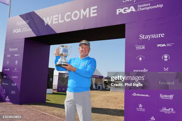 Paul Broadhurst of England poses with the trophy after the final round of the Staysure PGA Championship at Formby Golf Club on August 01, 2021 in...