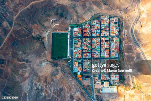 aerial view of colorful houses in las palmas de gran canaria, spain - football pitch above stock pictures, royalty-free photos & images