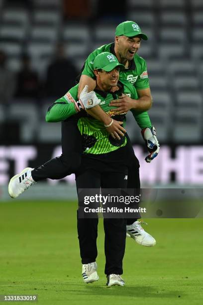 Quinton de Kock of Southern Brave celebrates with Jake Lintott after running out Mohammad Nabi of London Spirit during The Hundred match between...