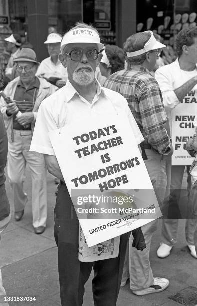 One member of the United Federation Of Teachers union demonstrates on 5th Avenue during the Labor Day parade, New York, New York, September 7, 1987.