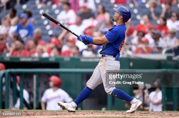 Rafael Ortega of the Chicago Cubs hits a two-run home run in the eighth inning against the Washington Nationals at Nationals Park on August 01, 2021...