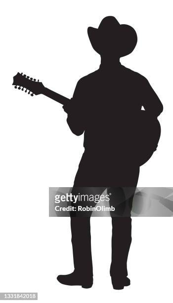 cowboy spielt gitarrensilhouette. - country and western music stock-grafiken, -clipart, -cartoons und -symbole