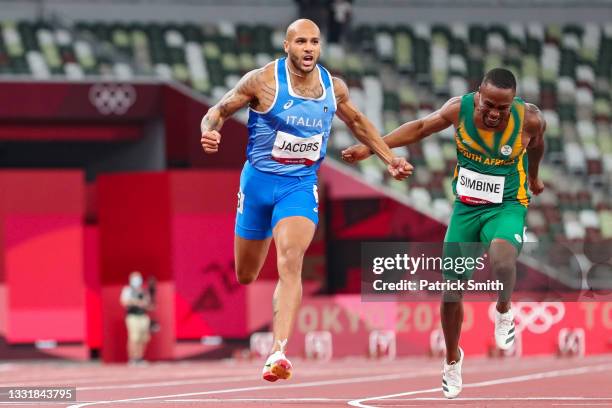 Lamont Marcell Jacobs of Team Italy wins the Men's 100m Final on day nine of the Tokyo 2020 Olympic Games at Olympic Stadium on August 01, 2021 in...