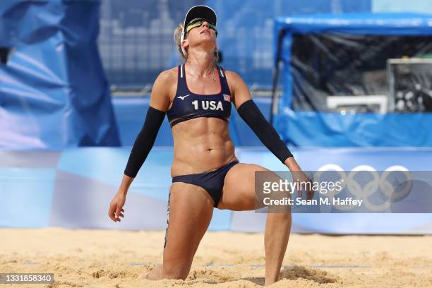 April Ross of Team United States reacts after the play against Team Cuba during the Women's Round of 16 beach volleyball on day ten of the Tokyo 2020...