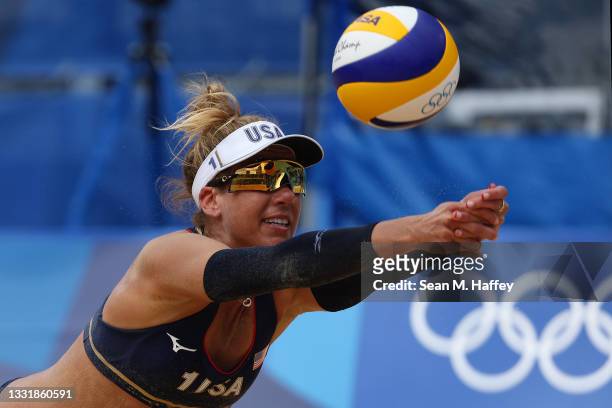 April Ross of Team United States dives for the ball against Team Cuba during the Women's Round of 16 beach volleyball on day ten of the Tokyo 2020...