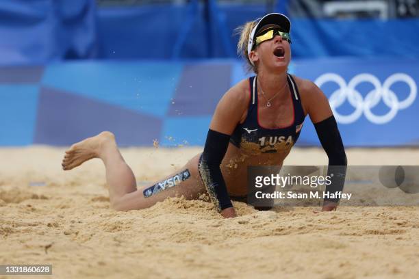 April Ross of Team United States reacts after the play against Team Cuba during the Women's Round of 16 beach volleyball on day ten of the Tokyo 2020...