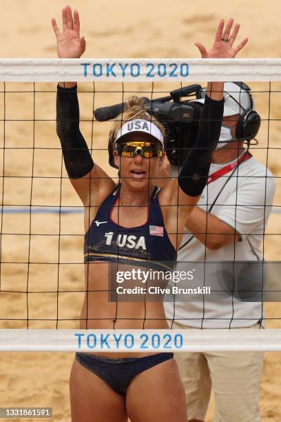 April Ross of Team United States celebrates after defeating Team Cuba during the Women's Round of 16 beach volleyball on day ten of the Tokyo 2020...