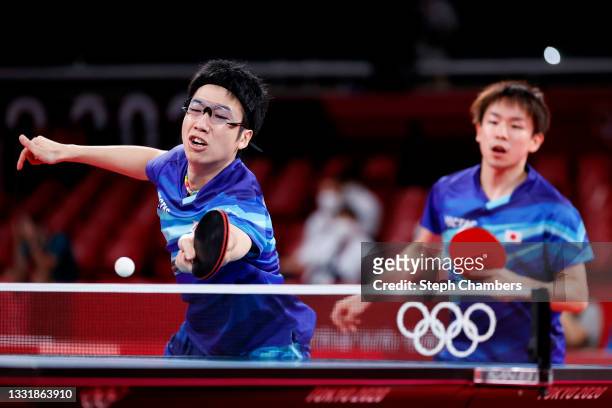 Jun Mizutani and Koki Niwa of Team Japan during their Men's Team Round of 16 table tennis match in action on day ten of the Tokyo 2020 Olympic Games...