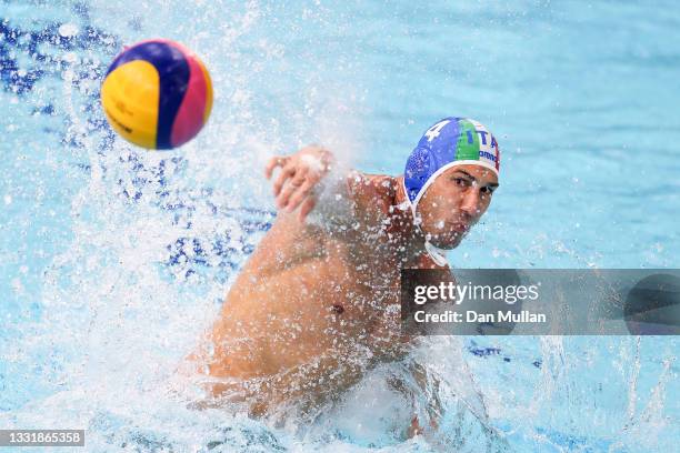 Pietro Figlioli of Team Italy scores a goal from a penalty throw during the Men's Preliminary Round Group A match between Hungary and Italy on day...