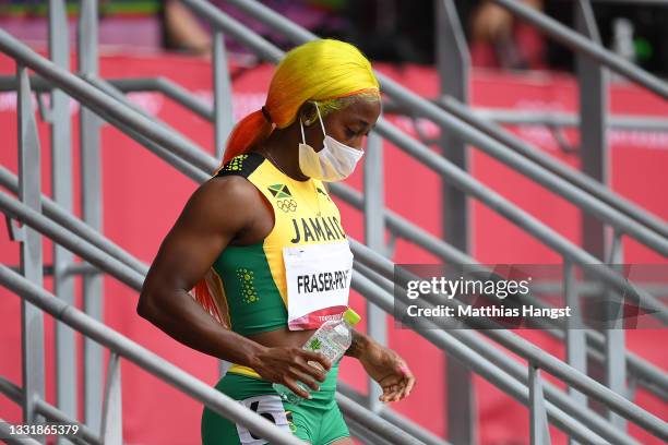 Shelly-Ann Fraser-Pryce of Team Jamaica looks on after competing in round one of the Women's 200m heats on day ten of the Tokyo 2020 Olympic Games at...