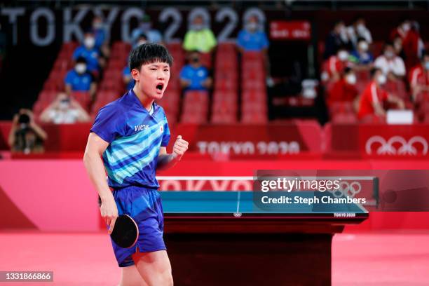 Tomokazu Harimoto of Team Japan reacts during his Men's Team Round of 16 table tennis match on day ten of the Tokyo 2020 Olympic Games at Tokyo...