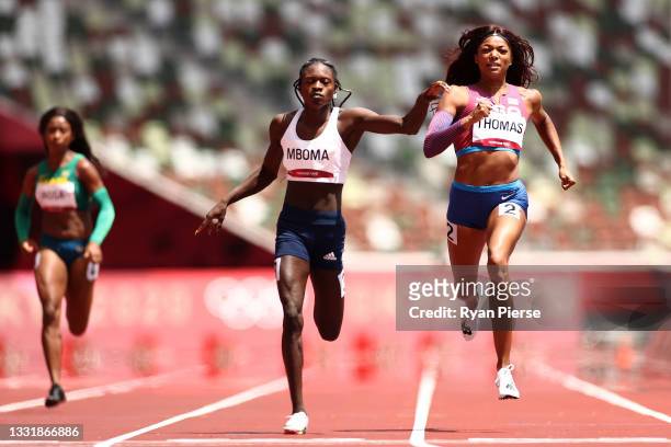 Christine Mboma of Team Namibia and Gabrielle Thomas of Team United States compete in round one of the Women's 200m heats on day ten of the Tokyo...