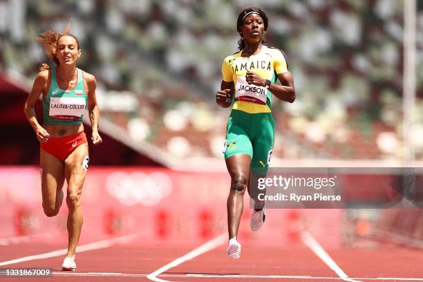 Ivet Lalova-Collio of Team Bulgaria and Shericka Jackson of Team Jamaica compete in round one of the Women's 200m heats on day ten of the Tokyo 2020...