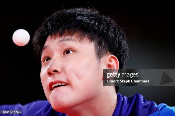 Tomokazu Harimoto of Team Japan serves during his Men's Team Round of 16 table tennis match on day ten of the Tokyo 2020 Olympic Games at Tokyo...