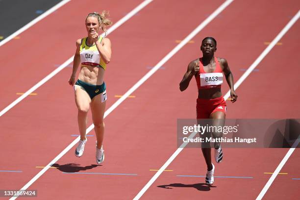 Riley Day of Team Australia and Gina Bass of Team Gambia compete in round one of the Women's 200m heats on day ten of the Tokyo 2020 Olympic Games at...