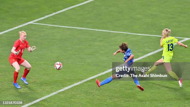 Mina Tanaka of Team Japan scores her side's first goal during the Women's Quarter Final match between Sweden and Japan on day seven of the Tokyo 2020...