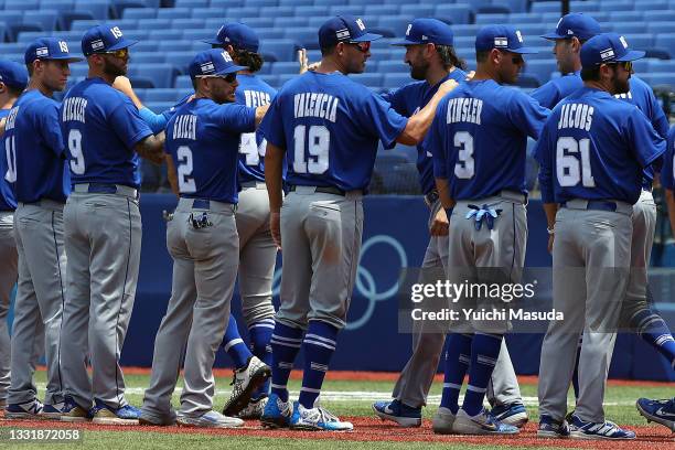 Team Israel take the field for pregame ceremonies before the game against Team South Korea during the knockout stage of men's baseball on day ten of...