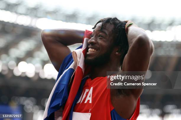 Maykel Masso of Team Cuba reacts after winning the bronze medal in the Men's Long Jump Final on day ten of the Tokyo 2020 Olympic Games at Olympic...