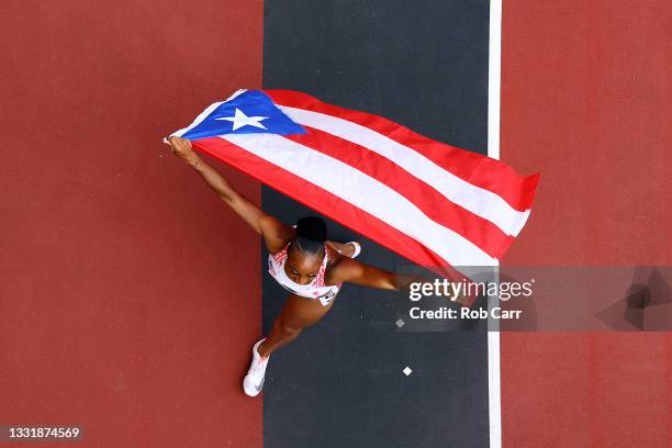 Jasmine Camacho-Quinn of Team Puerto Rico celebrates after winning the gold medal in the Women's 100m Hurdles Final on day ten of the Tokyo 2020...