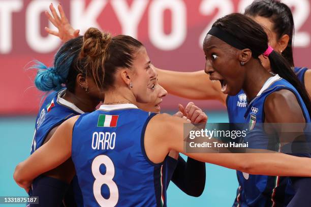 Paola Ogechi Egonu of Team Italy celebrates with teammates against Team United States during the Women's Preliminary - Pool B volleyball on day ten...