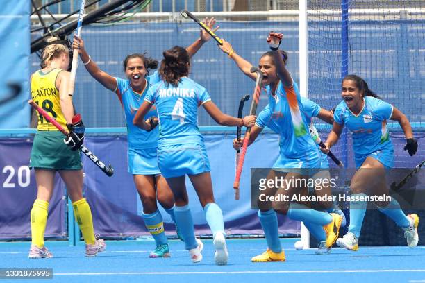 Monika, Navjot Kaur, Rani and Neha Neha of Team India celebrate the second goal scored while Jane-Anne Claxton of Team Australia walks away during...