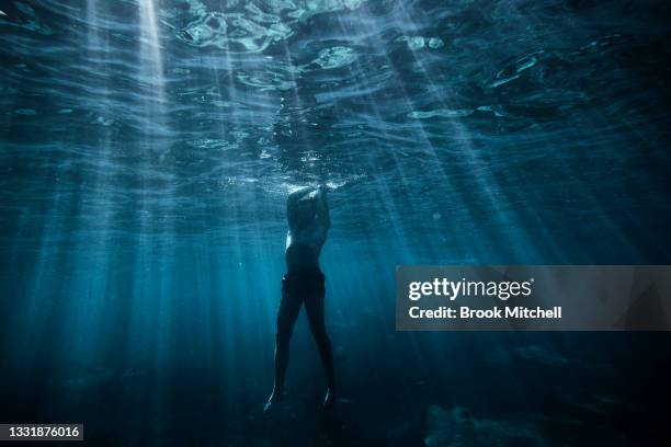 Swimmer is seen at Clovelly Beach in Sydney’s East on August 02, 2021 in Sydney, Australia. A top temperature of 18 degrees Celcius is expected to...