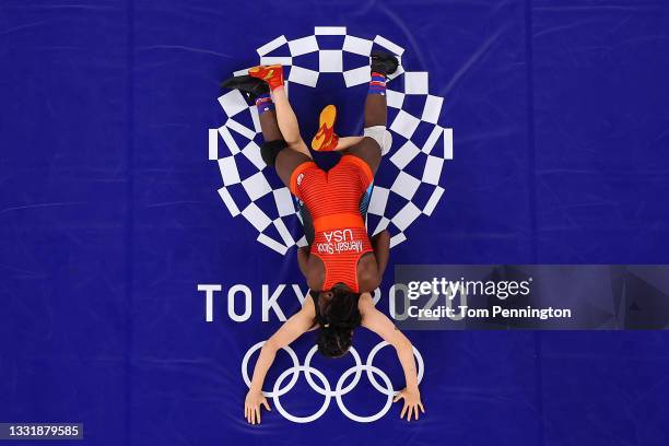 Tamyra Mariama Mensah-Stock of Team United States competes against Feng Zhou of Team China during the Women's Freestyle 68kg 1/4 Final on day ten of...