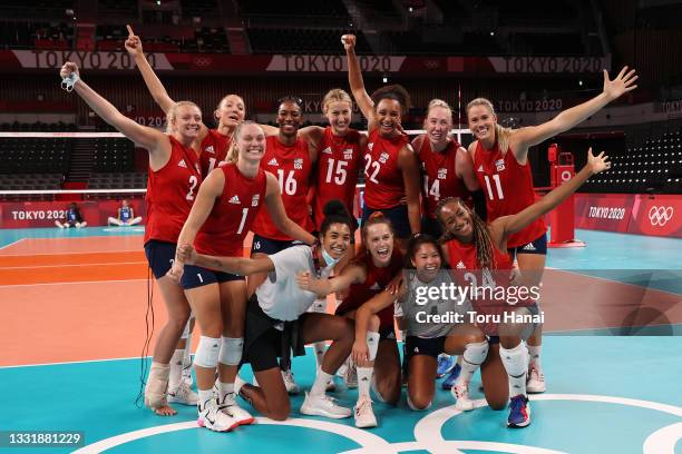 Team United States poses for a photo after defeating Team Italy during the Women's Preliminary - Pool B volleyball on day ten of the Tokyo 2020...